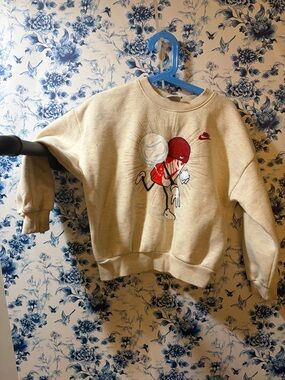 Nike Cream Crewneck Sweatshirt with Red Logo Graphic